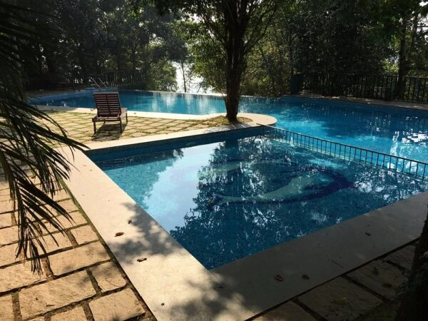 Infinity Pool at Wayanad Silverwoods Resort overlooking Banasura Lake